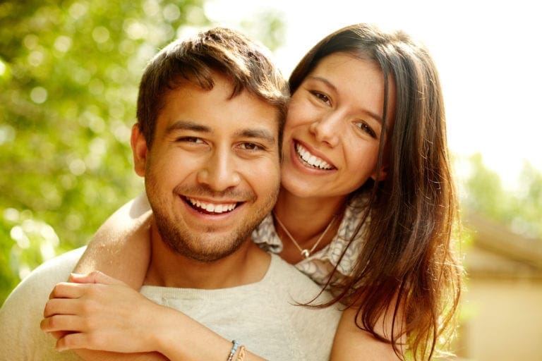 Young couple after visit to Minneapolis TMS Clinic