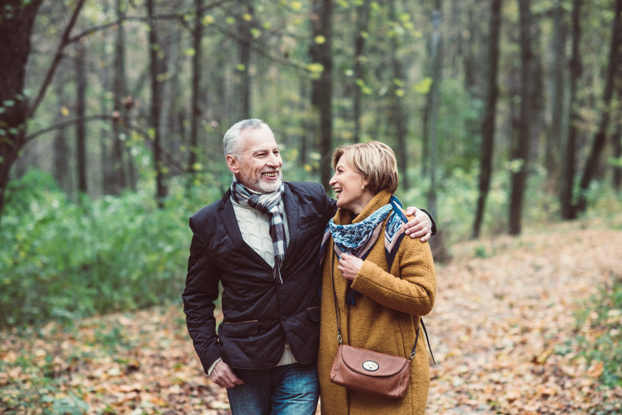 Couple walking outdoors, enjoying positive results from ketamine clinic in Minneapolis