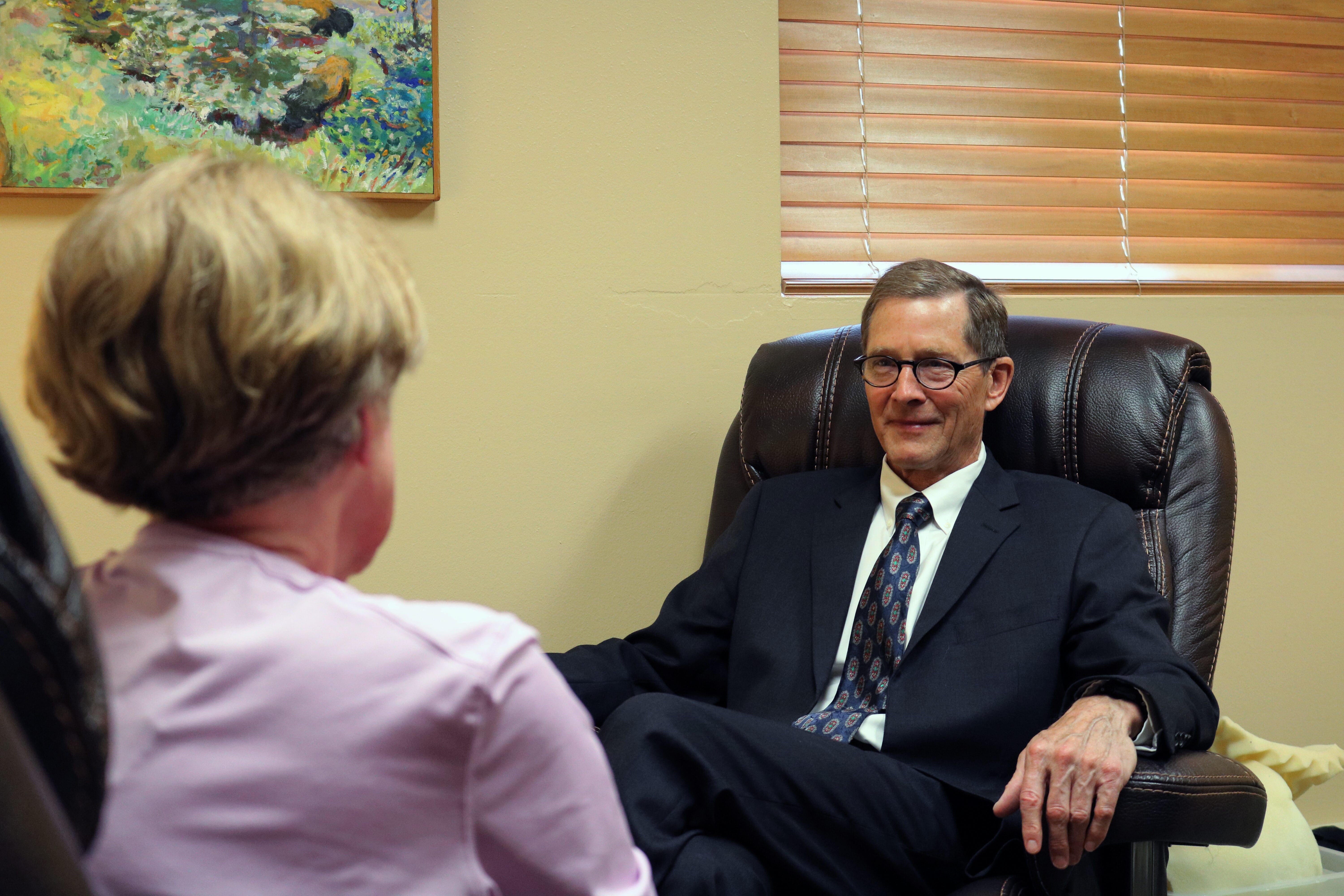 forensic psychiatrist stephen manlove sits across from patient during forensic psychiatry evaluation